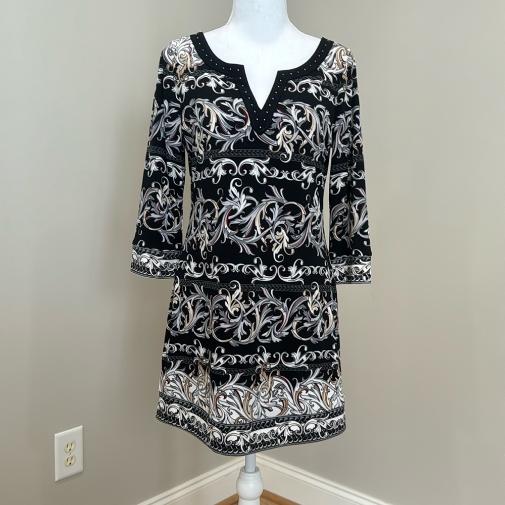 White House Black Market Black Tunic with Bold Gold and White Botanical Print​